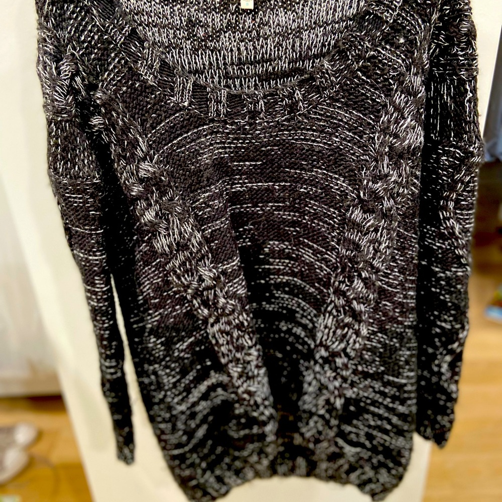Blue and white cable knit sweater